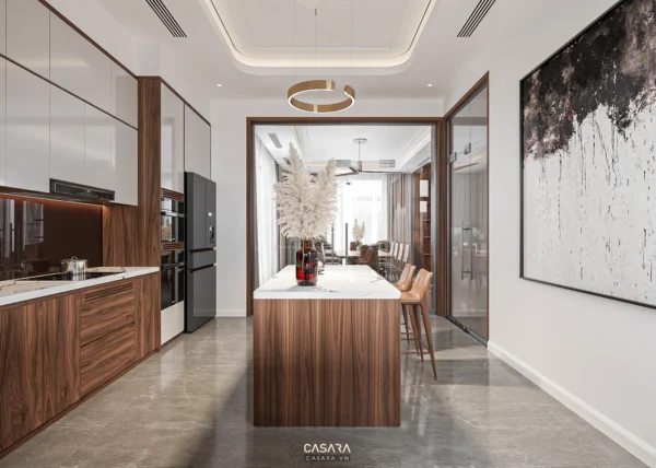 Phòng bếp hiện đại, sang trọng với thiết kế tối giản, ánh sáng ấm áp.