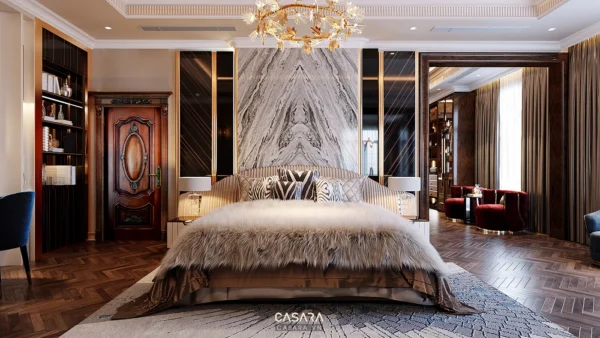 Phòng ngủ sang trọng với giường lớn, nội thất cầu kỳ và ánh sáng ấm áp.