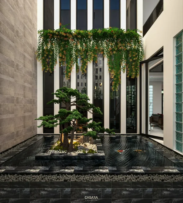 Tiểu cảnh sân vườn hiện đại với cây xanh và hồ nước nhỏ.