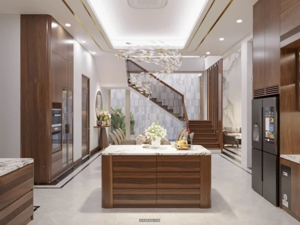 Phòng khách bếp hiện đại, sang trọng với đảo bếp và cầu thang đẹp mắt.