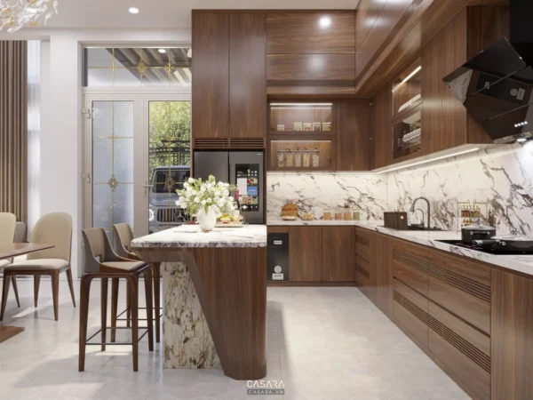 Phòng bếp hiện đại, sang trọng với tông màu gỗ ấm áp chủ đạo.