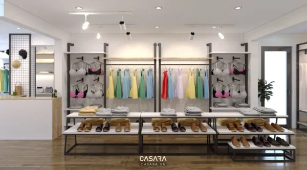 Cửa hàng thời trang nội thất sáng sủa, trưng bày quần áo, giày dép gọn gàng.