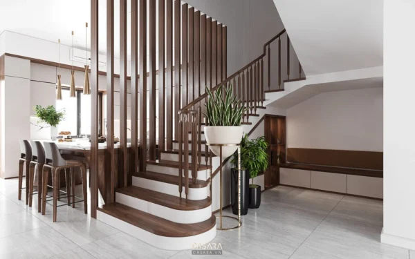 Nội thất hiện đại với cầu thang gỗ và khu vực bếp đảo sang trọng.