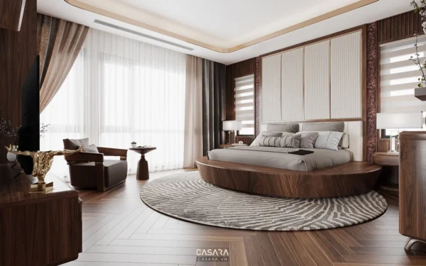 Phòng ngủ sang trọng, hiện đại với giường tròn và nội thất gỗ.