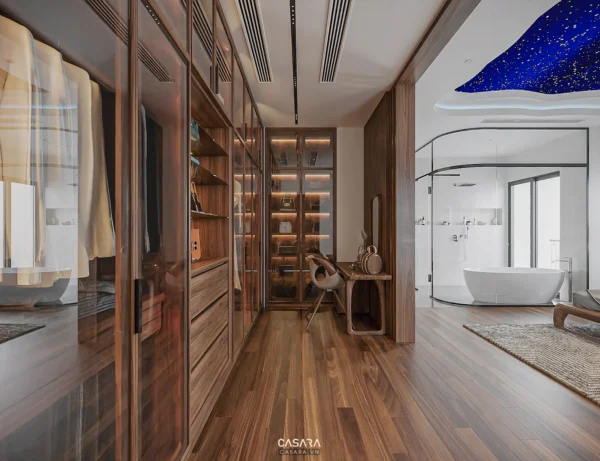 Phòng thay đồ và phòng tắm sang trọng, hiện đại với tông gỗ ấm áp.