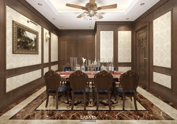Phòng ăn sang trọng với bàn ghế gỗ chạm khắc tinh tế, ấm cúng.