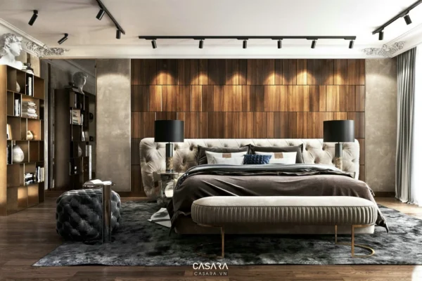 Phòng ngủ sang trọng với giường lớn, nội thất gỗ và ánh sáng ấm áp.