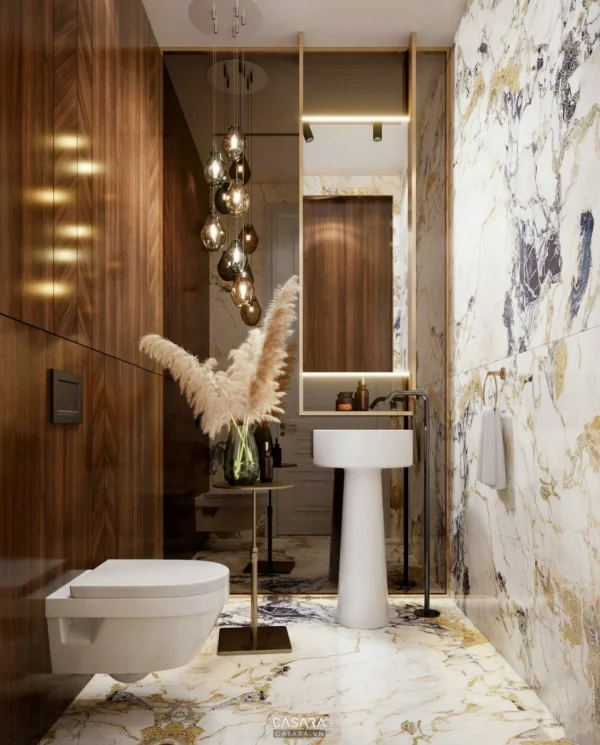 Phòng tắm hiện đại, sang trọng với đá hoa cương và đèn thả độc đáo.