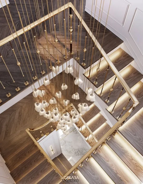 Cầu thang hiện đại với đèn chùm độc đáo, sang trọng.