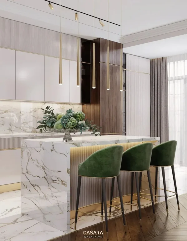 Phòng bếp hiện đại, sang trọng với đảo bếp và ghế bar xanh lục bảo.