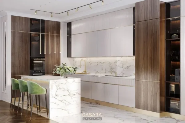 Phòng bếp hiện đại, sang trọng với nội thất gỗ và đá cao cấp.