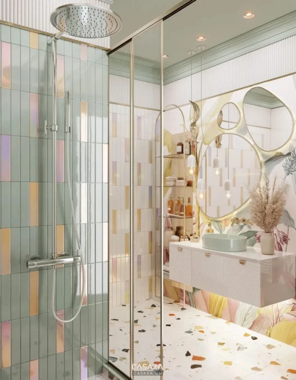 Phòng tắm hiện đại, tươi sáng với vòi sen kính và sàn terrazzo độc đáo.