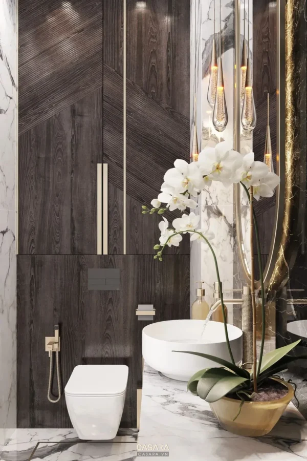 Phòng tắm sang trọng với thiết kế hiện đại, tinh tế và ánh sáng ấm áp.