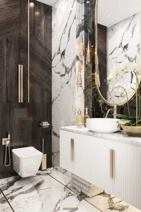Phòng tắm sang trọng với đá cẩm thạch và nội thất hiện đại.