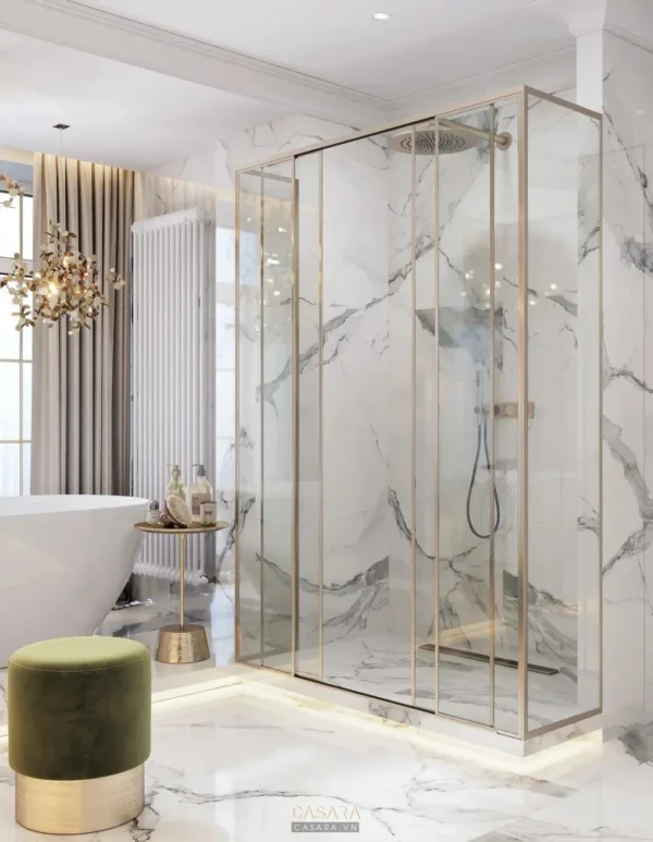 Phòng tắm sang trọng với vòi sen kính và bồn tắm trắng tinh tế.