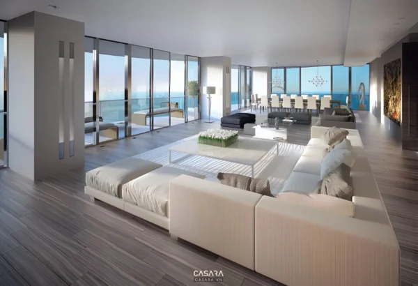 Không gian nội thất cao cấp có sofa lớn, cửa kính rộng và tầm nhìn thoáng