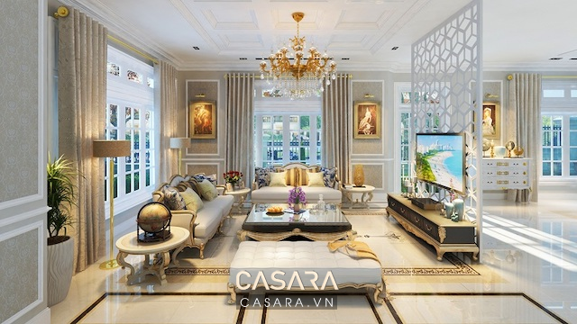 Mẫu nhà phòng khách đẹp phối màu sơn kem nâu đất với sofa lớn và cửa kính