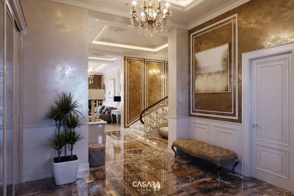 Sảnh đón khách sang trọng với đèn chùm pha lê và tông màu vàng ấm áp.