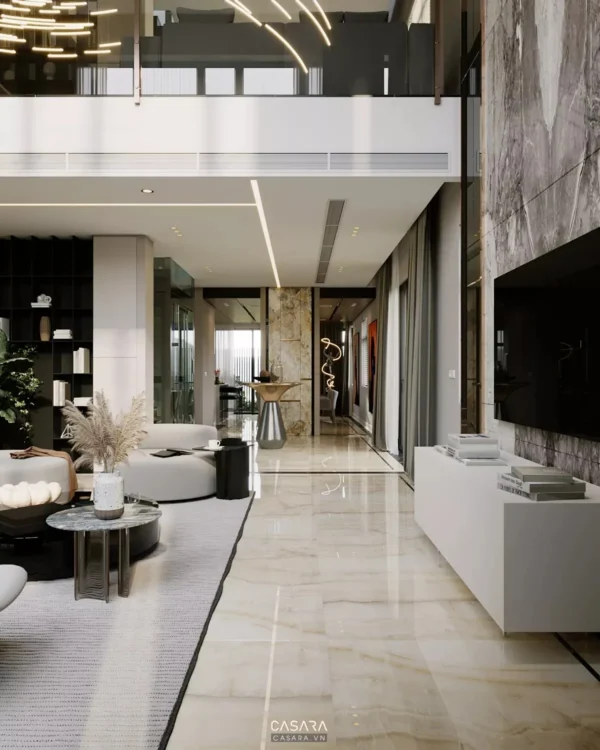 Sảnh khách sạn sang trọng với thiết kế hiện đại, ánh sáng ấm áp.