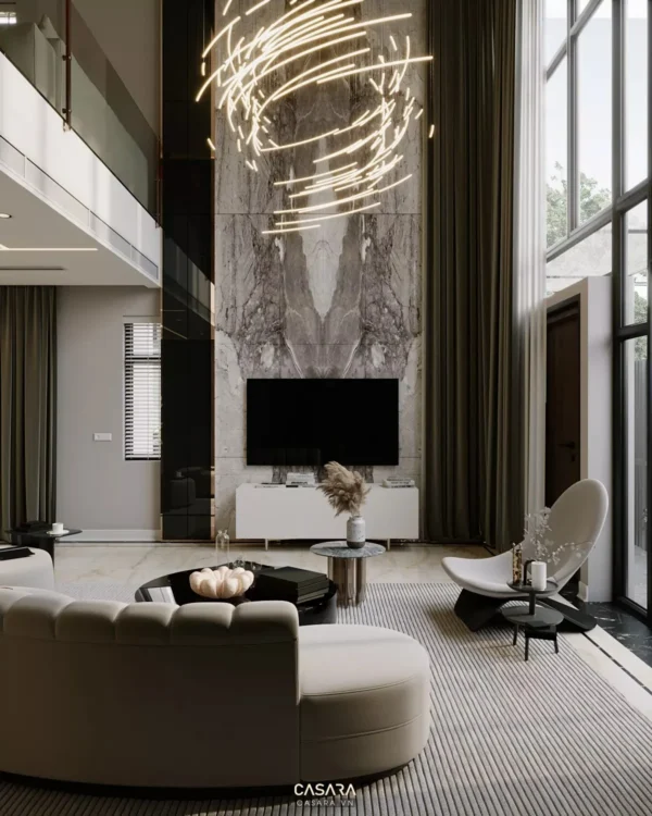 Phòng khách hiện đại, sang trọng với điểm nhấn từ đèn và đá ốp tường.