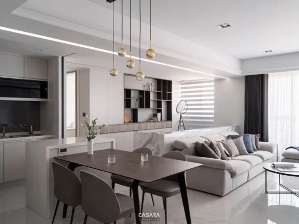 Phòng khách bếp hiện đại, tối giản với tông màu trung tính ấm cúng.