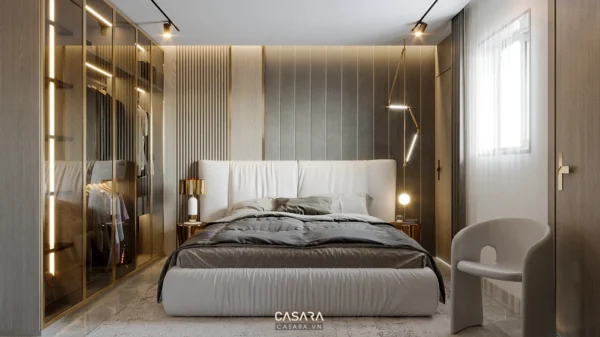 Phòng ngủ hiện đại, sang trọng với tủ âm tường và ánh sáng vàng ấm áp.