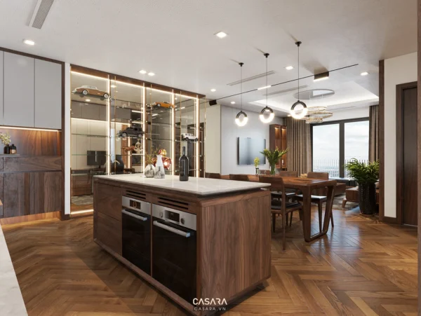 Phòng bếp hiện đại, sang trọng với đảo bếp lớn và tông màu gỗ ấm áp.