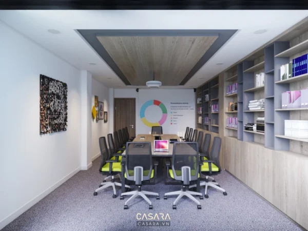 Phòng họp hiện đại, sáng sủa với bàn ghế và kệ sách.