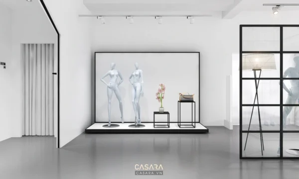 Không gian cửa hàng thời trang tối giản, sang trọng với манекенов.