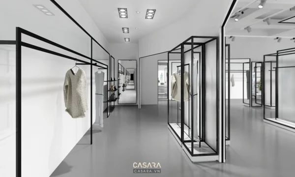 Không gian cửa hàng thời trang hiện đại với tông trắng chủ đạo.