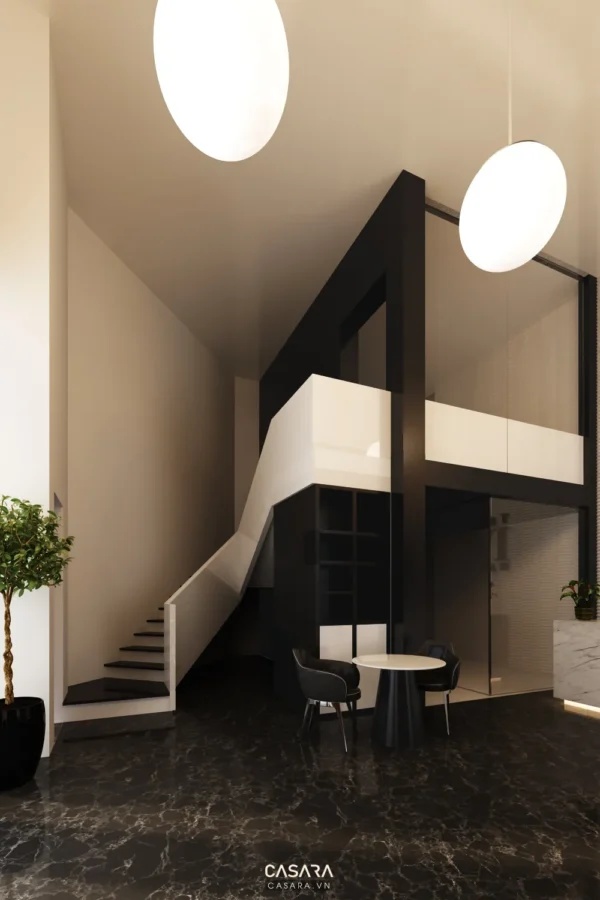 Nội thất hiện đại với cầu thang đen trắng ấn tượng, sang trọng.