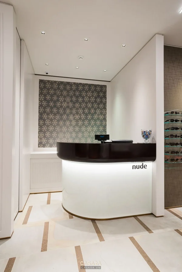 Quầy lễ tân hiện đại, sang trọng với thiết kế tối giản, tinh tế.