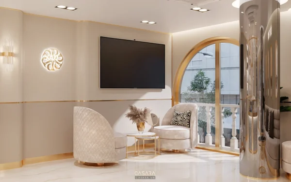 Phòng khách hiện đại, sang trọng với nội thất trắng kem và điểm vàng.