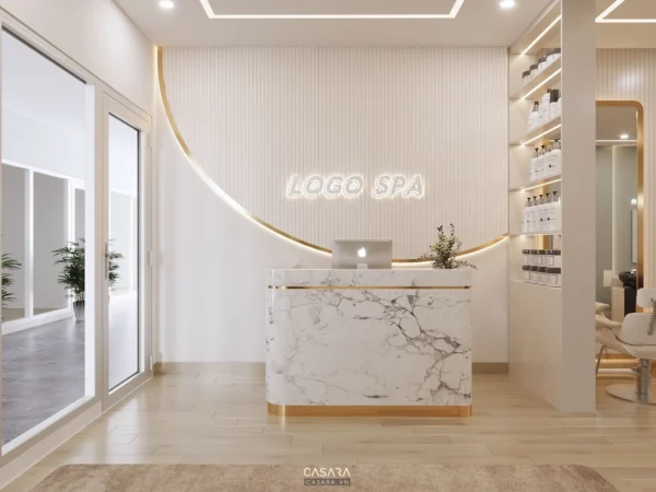 Khu vực lễ tân spa sang trọng với thiết kế trắng tinh tế, hiện đại.