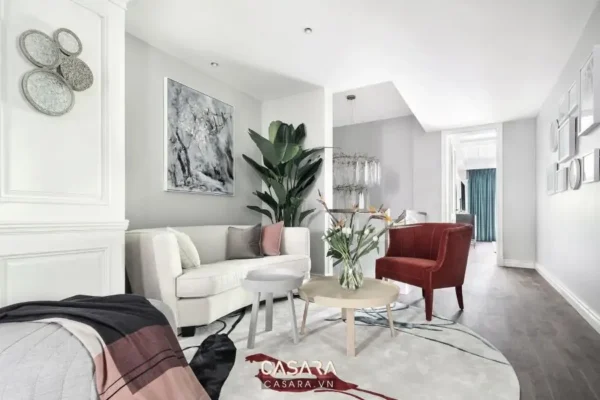 Phòng khách hiện đại, sang trọng với tông màu trắng chủ đạo.