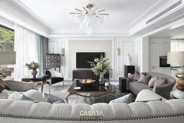 Phòng khách hiện đại, sang trọng với nội thất tinh tế, tông màu trắng chủ đạo.