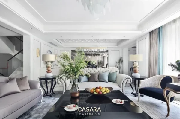Phòng khách hiện đại, sang trọng với tông màu trắng chủ đạo.