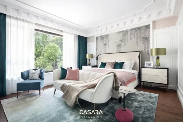 Phòng ngủ sang trọng với giường lớn, nội thất tinh tế, ánh sáng dịu nhẹ.