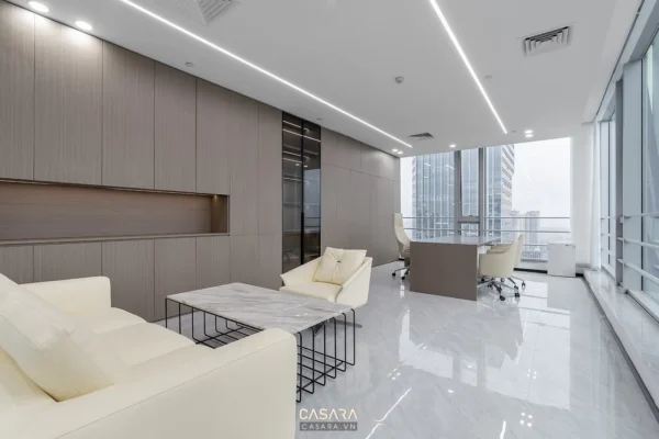 Phòng họp hiện đại, sang trọng với nội thất tối giản, ánh sáng dịu nhẹ.