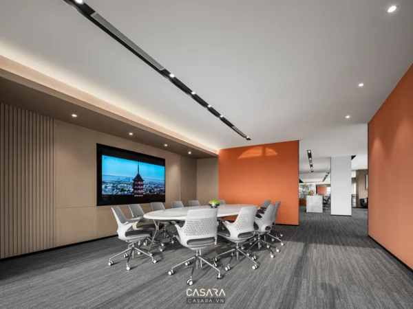 Phòng họp hiện đại với TV lớn, bàn họp và hệ thống chiếu sáng tinh tế.