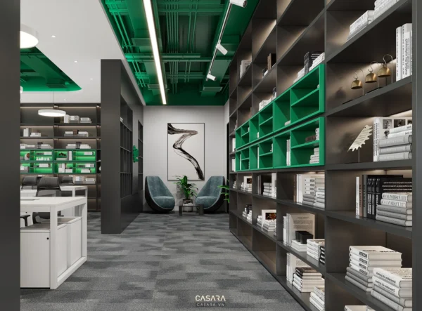 Không gian văn phòng hiện đại với kệ sách và nội thất màu xanh lục.