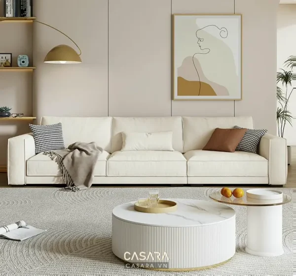 Phòng khách hiện đại với bộ sofa trắng nổi bật.