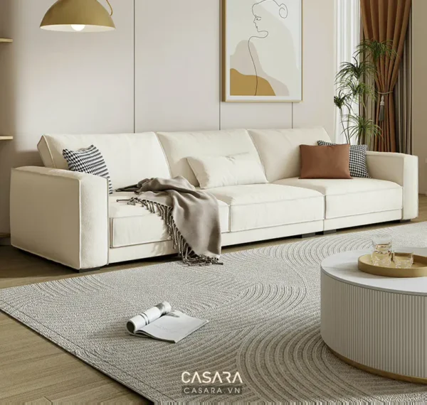 Phòng khách hiện đại với bộ sofa trắng nổi bật.