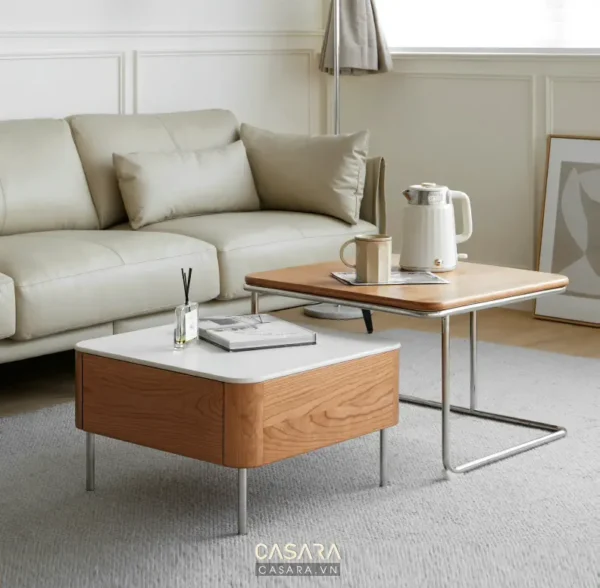 Góc phòng khách hiện đại với sofa da và bàn trà thiết kế độc đáo.