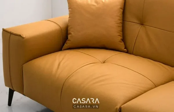 Ghế sofa da màu vàng mù tạt, thiết kế hiện đại, sang trọng.