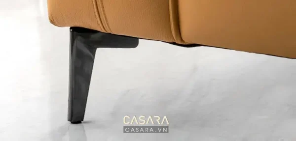 Chân ghế sofa da màu vàng cam hiện đại, thiết kế tối giản.