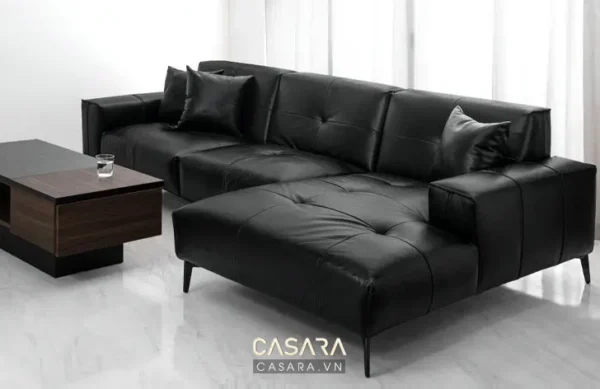Bộ sofa góc da đen hiện đại, sang trọng trong không gian phòng khách.