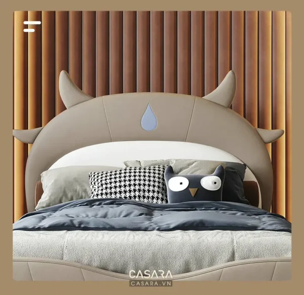 Giường ngủ hình bò sữa dễ thương, phù hợp phòng trẻ em.