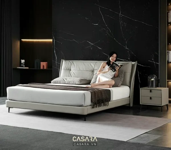 Phòng ngủ hiện đại, sang trọng với giường êm ái và ánh sáng ấm áp.