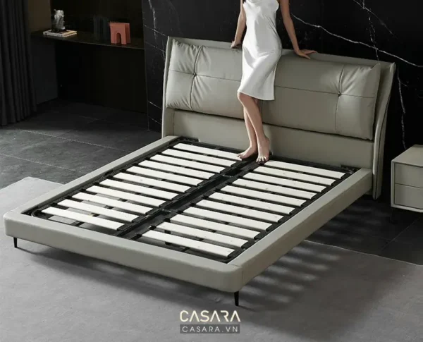 Giường ngủ hiện đại, sang trọng với thiết kế tối giản, màu sắc trung tính.